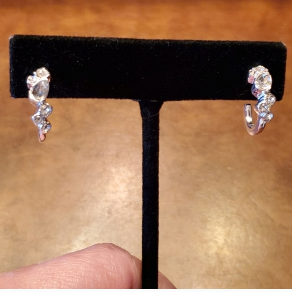 Avon Silver Tone Crystal Huggie Earrings